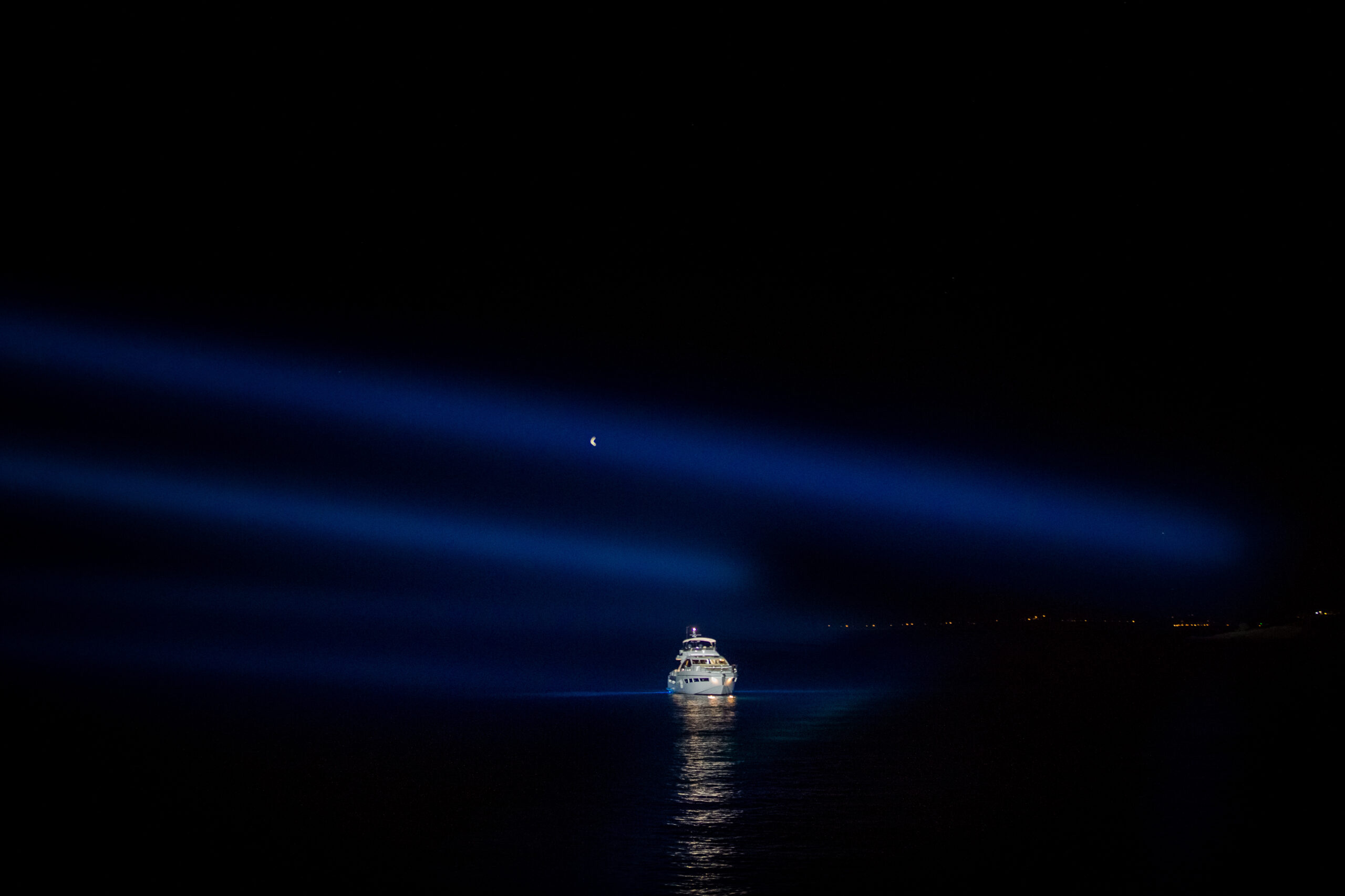 A luxury yacht going for fishing trip in Dubai at night