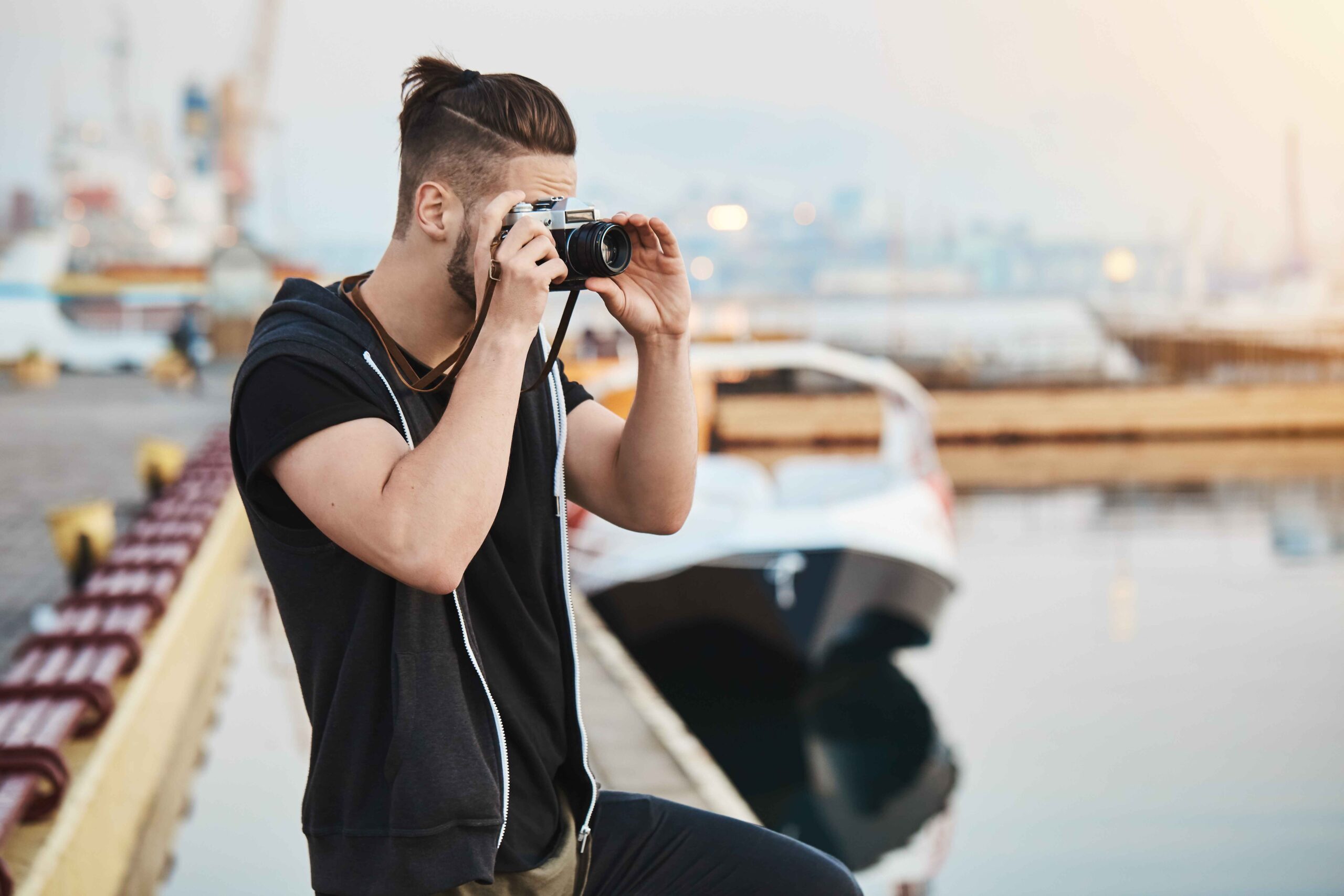 Image of a man doing photography in dubai marina